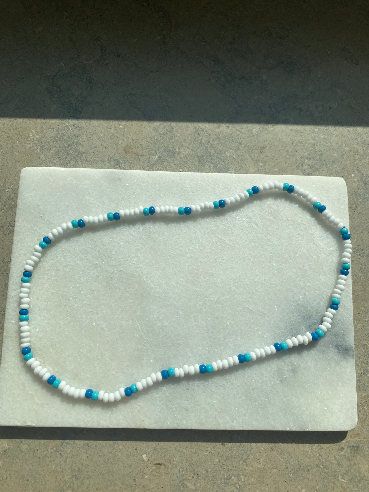 White and blue necklace