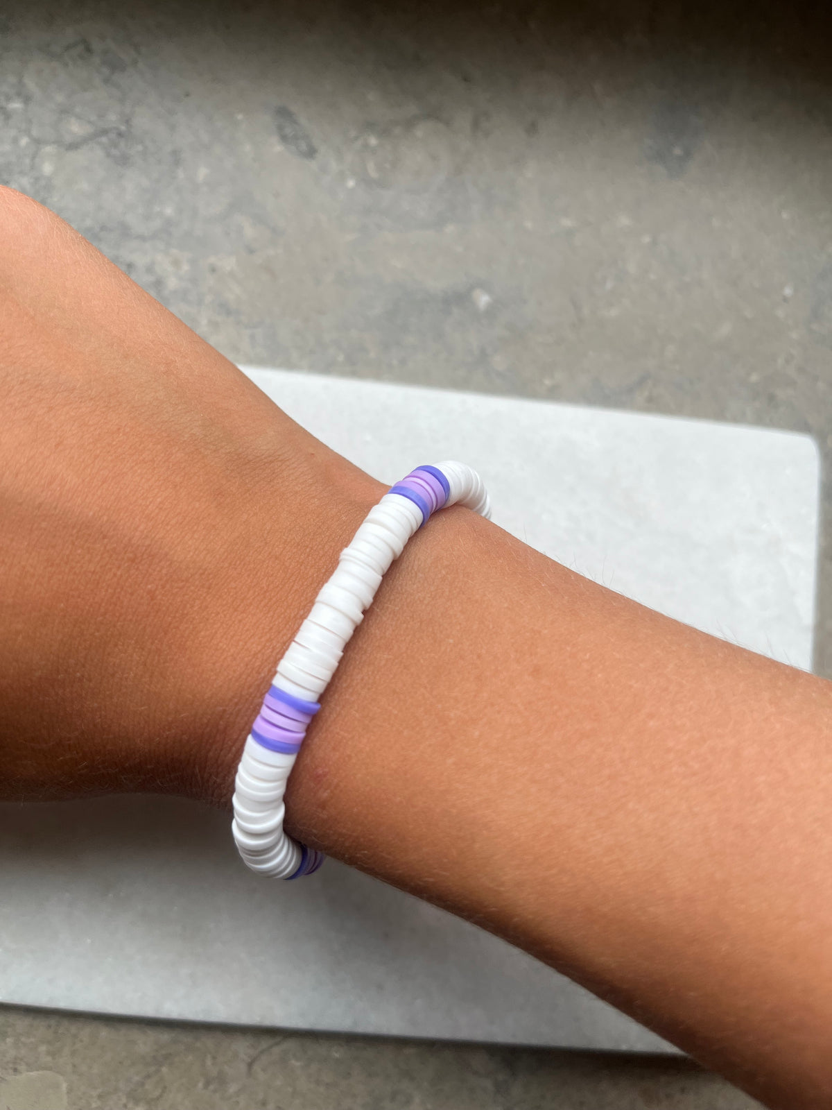 Purple and white bracelet