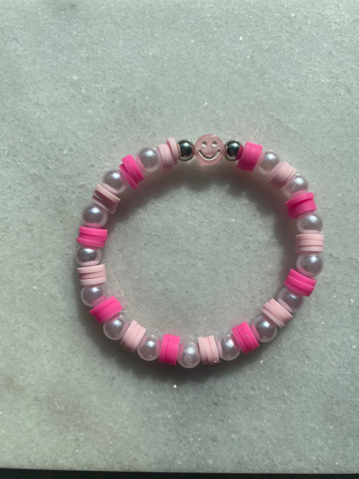Pink smiley face bracelet
